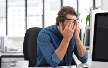 Man frustrated due the disadvantages of the company's old HR Software