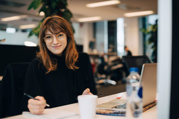 Women at work smiling