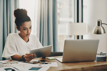 Women working from her tablet